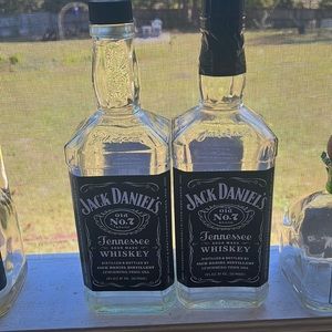 COPY - COPY - Empty Jack Daniel’s bottles for crafting.